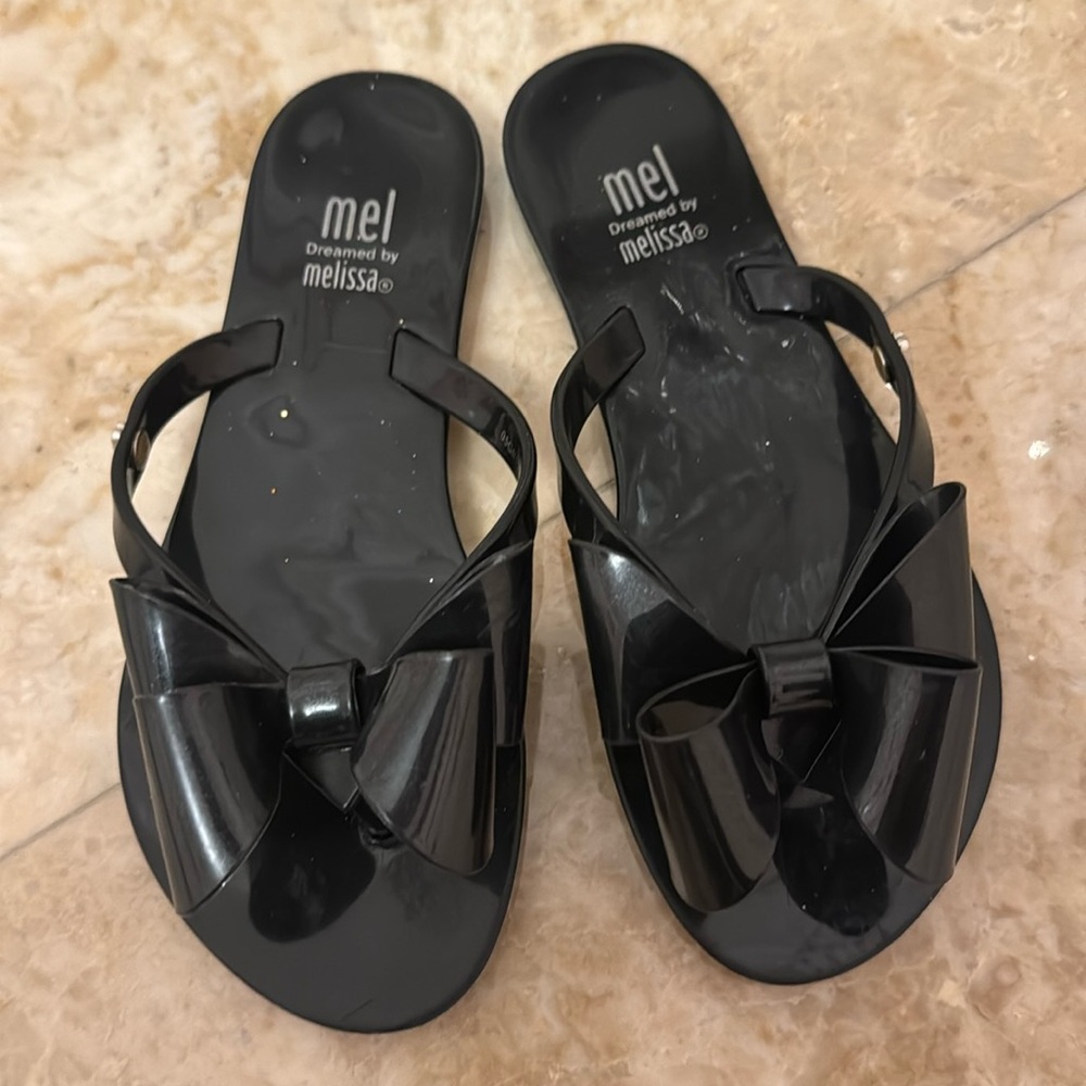 Black Melissa jelly flip flops